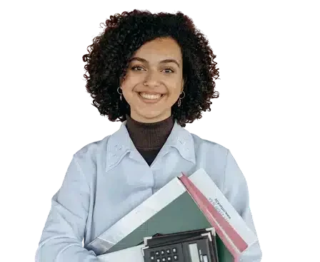 A young woman with curly hair smiles while holding books, folders, and a calculator against a plain background. She is dressed in a light blue shirt and appears confident and prepared.