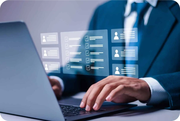 A person in a suit types on a laptop with virtual checklists and profile icons appearing as holograms in front of the screen, symbolizing digital data management or online task organization.