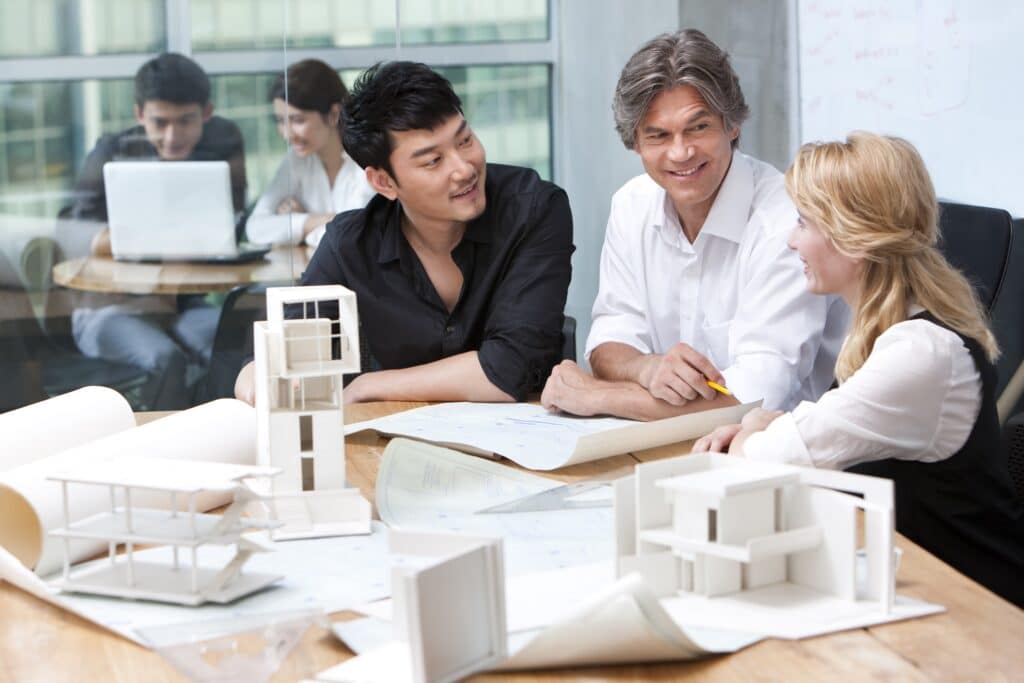 Architects studying a blueprint